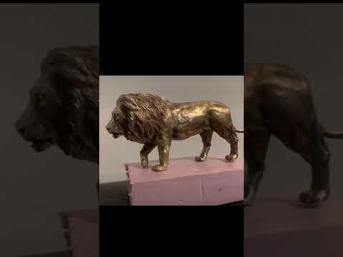 Making a bronze lion Trying to figure out the YouTube short feature bronze art foundry