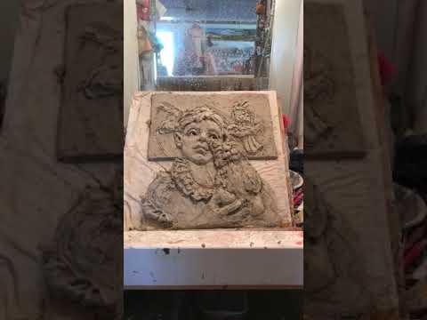 Process on large stoneware paperclay relief sculpture