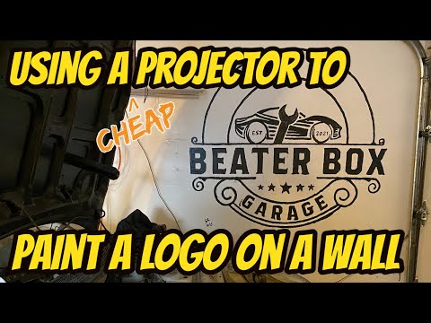 Painting a wall logo using a projector