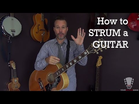 How to Strum a Guitar Correctly  Beginner Lesson